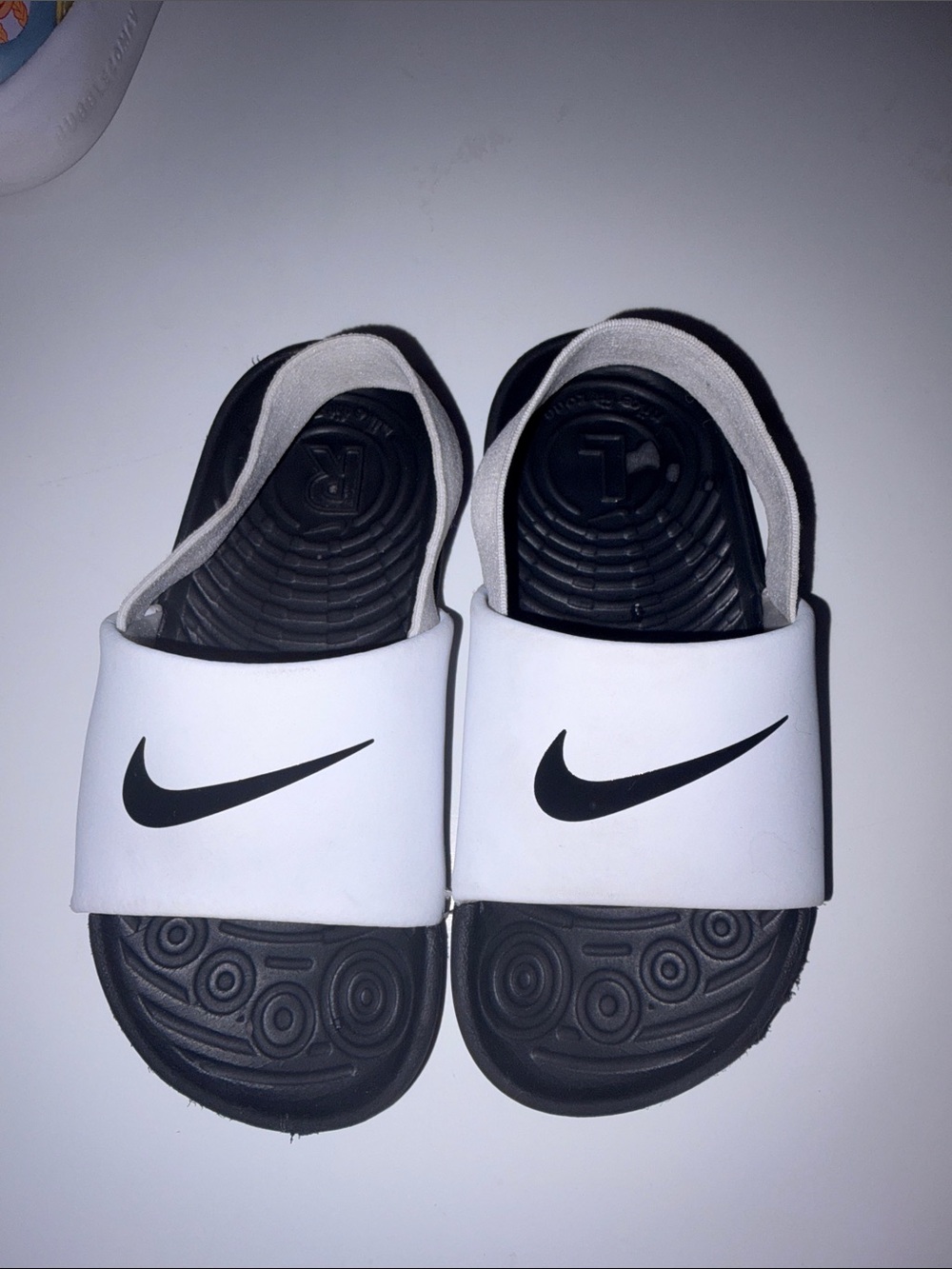 Nike Kids White and Black Slide Sandals with Swoosh